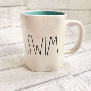 Rae Dunn White with blue interior SWIM mug